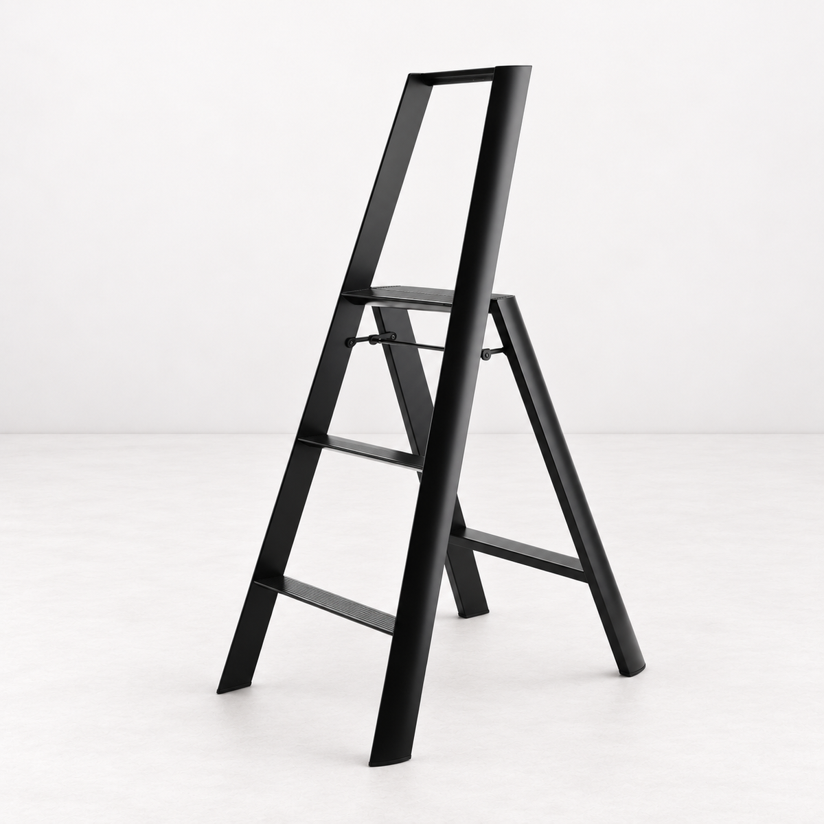 Black Hasegawa Lucano 3-step ladder in matte black aluminum and steel with a minimalist design and safety bar.