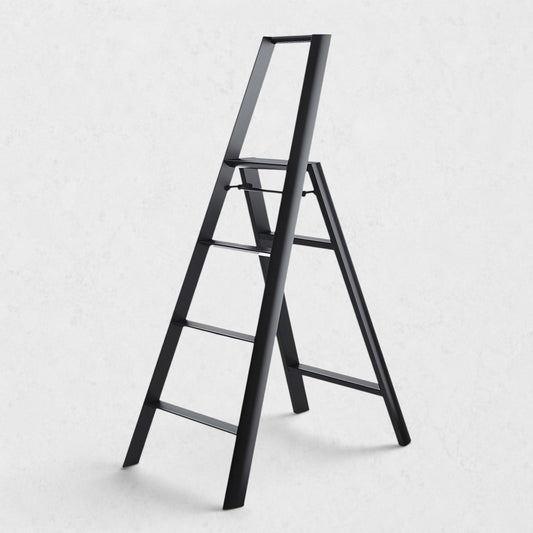 Hudson Grace black Hasegawa Lucano 4-step ladder with a minimalist matte finish, safety bar, and grooved treads.