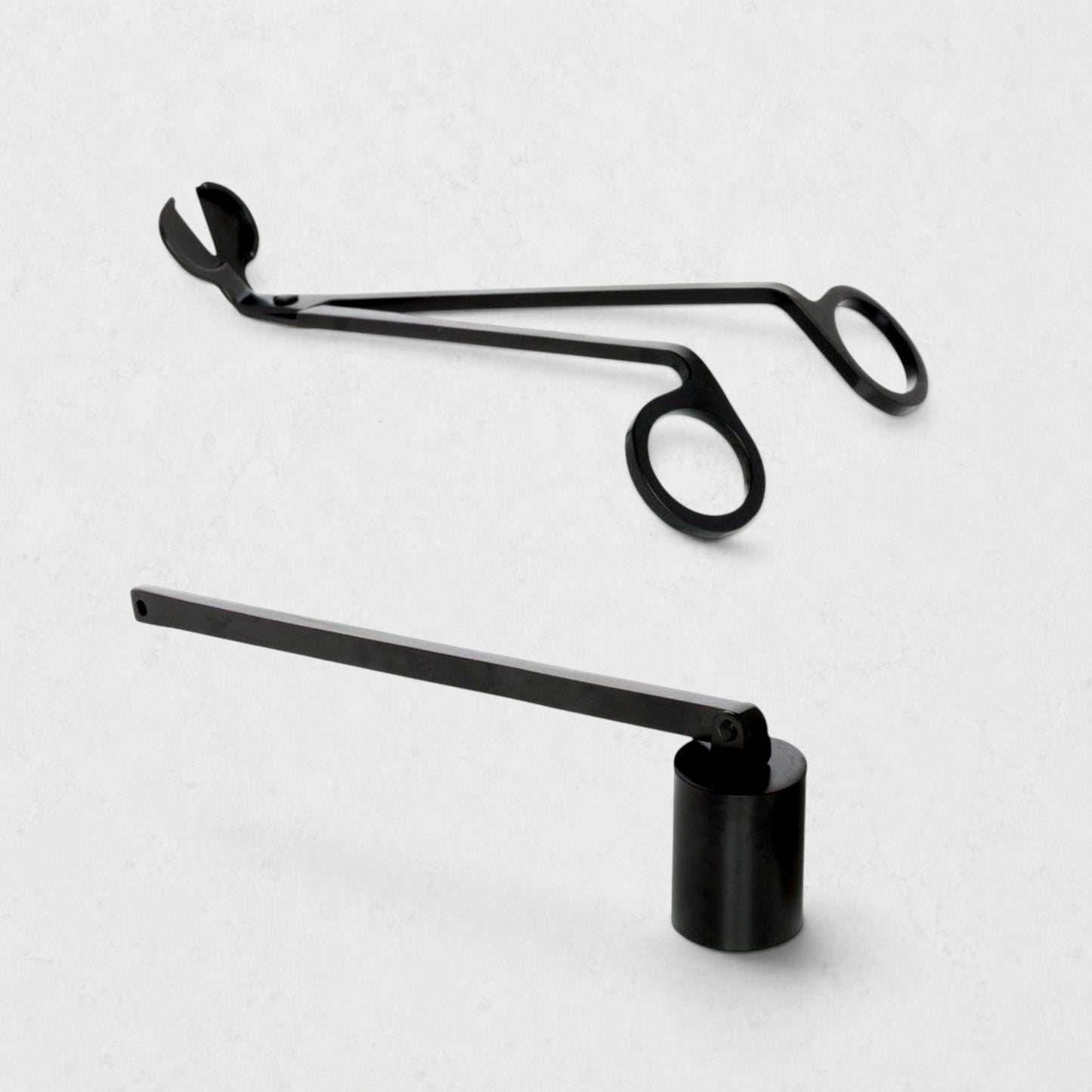Black matte metal candle wick trimmer and snuffer set. Trimmer is 6.5" long, snuffer is 7.5" long.