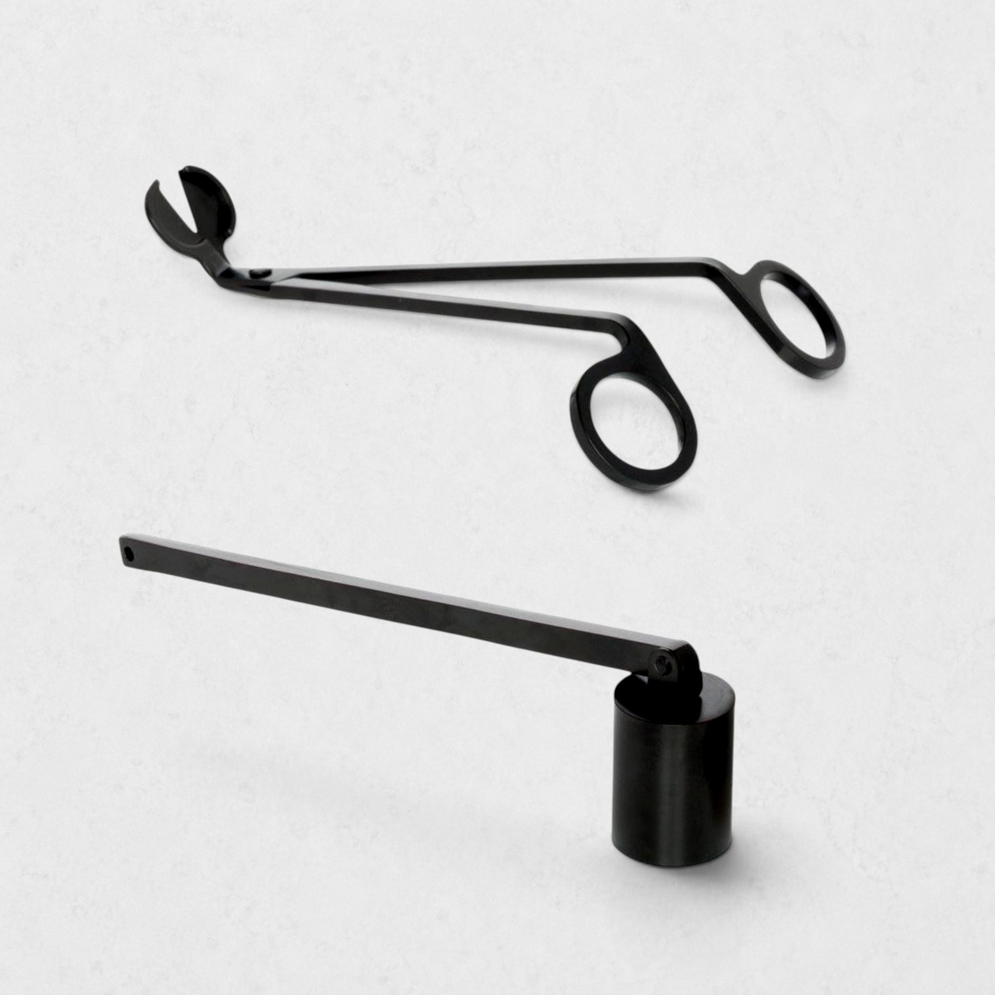 Black matte metal candle wick trimmer and snuffer set. Trimmer is 6.5" long, snuffer is 7.5" long.