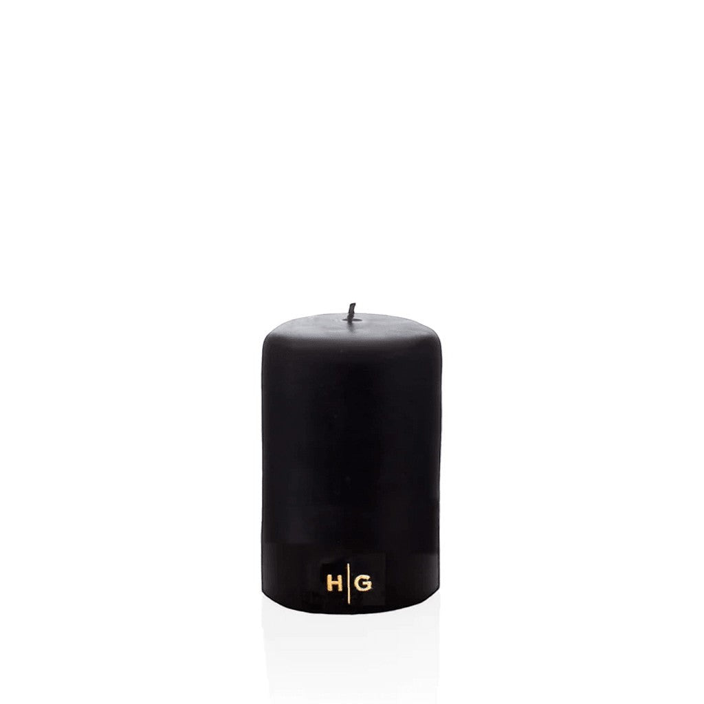 HG Black Unscented Pillar Candle, 3"x4", with gold embossed HG logo.