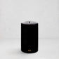 HG Black Unscented Pillar Candle, 4"x6", with gold HG logo.