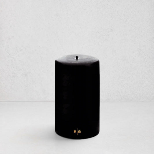 HG Black Unscented Pillar Candle, 4"x6", with gold HG logo.