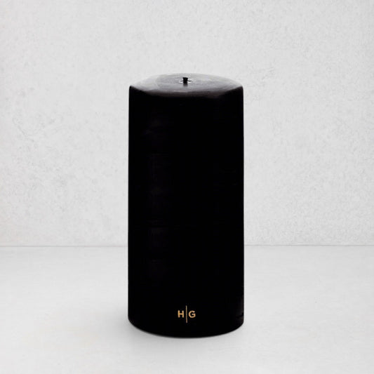 HG Black Unscented Pillar Candle, 4"x8", with gold HG logo, oversized cotton wick.