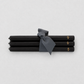 Set of five 10-inch black unscented taper candles tied with a grey ribbon, featuring a gold embossed Hudson Grace logo.