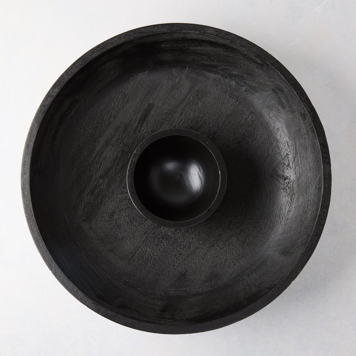 Black 15"Dia mango wood chip and dip platter with built-in dipping bowl.