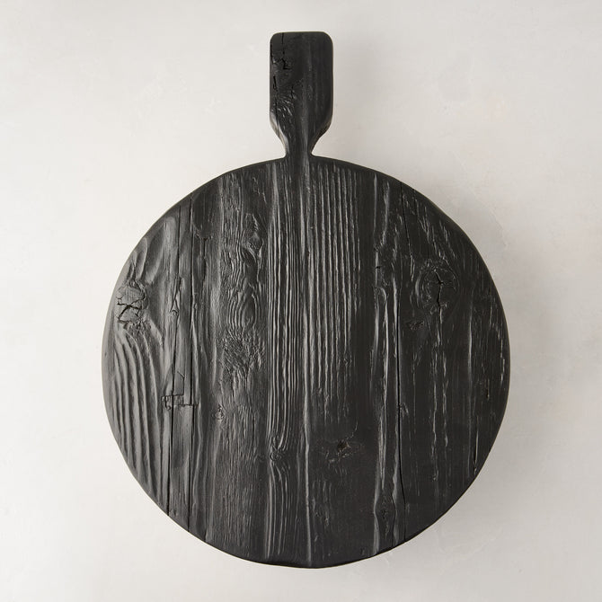 Black round footed serve board with handle, hand-carved European pine wood, 19.7 x 15 x 3.3".