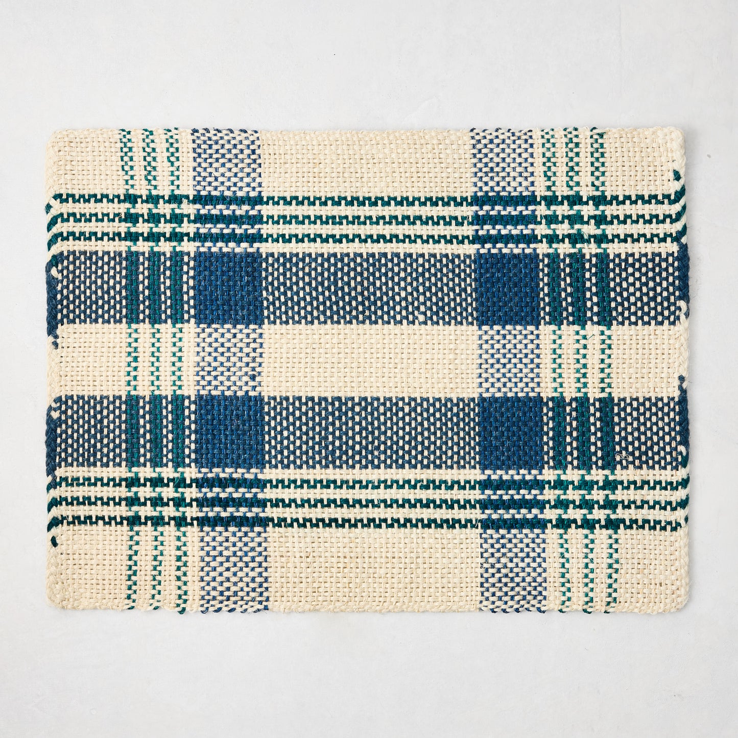Blue and green woven plaid rectangular placemat made from abaca and jute, 19"W x 14"L.