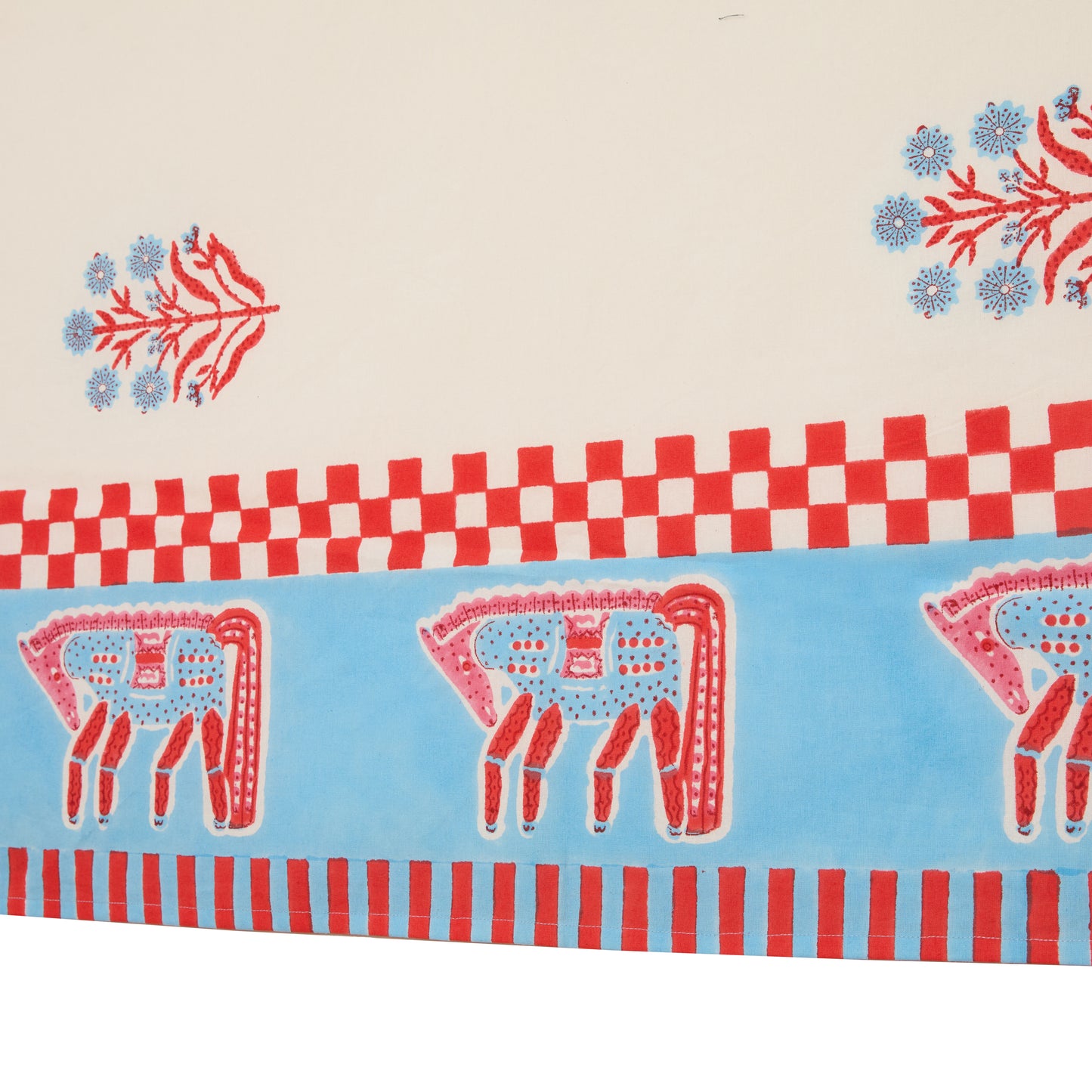 Cotton tablecloth with red floral block print, blue trim, and red and blue horse motifs.