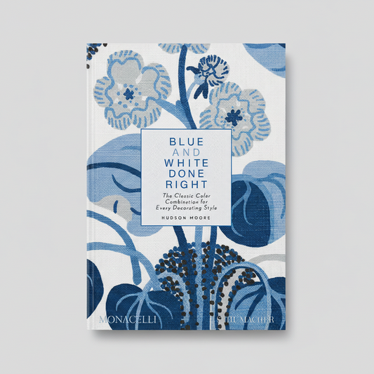 Hardcover coffee table book, "Blue and White Done Right," with a floral pattern in various blue tones.