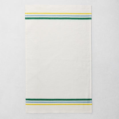 White cotton-linen hand towel with blue, green, and yellow triple stripes on top and bottom.