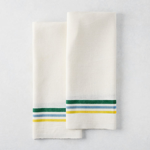 Set of 2 white cotton-linen hand towels with blue, green, and yellow triple stripes.