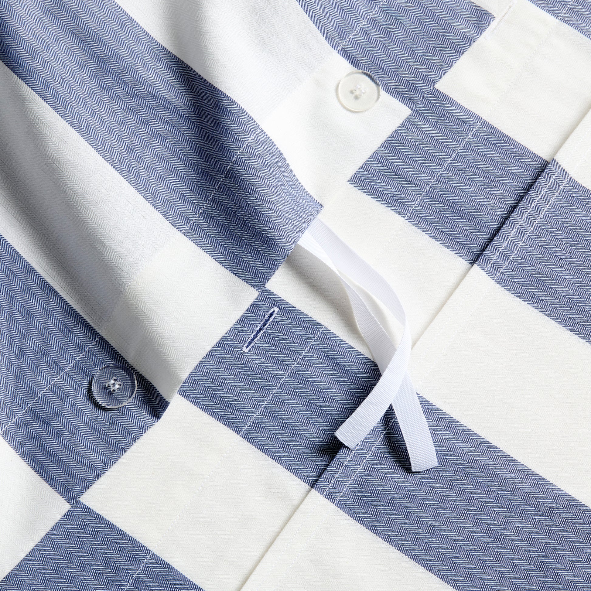 Herringbone Wide Blue Stripe Duvet and Shams Set, 100% cotton with tie closures and button details.