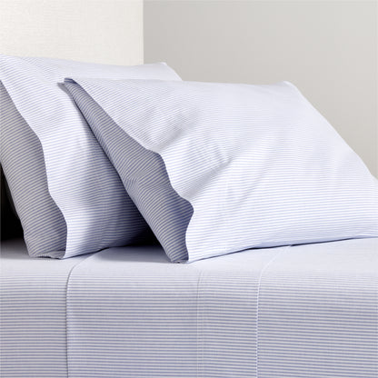 Blue Oxford Stripe Cotton Sheet Set with two pillowcases.