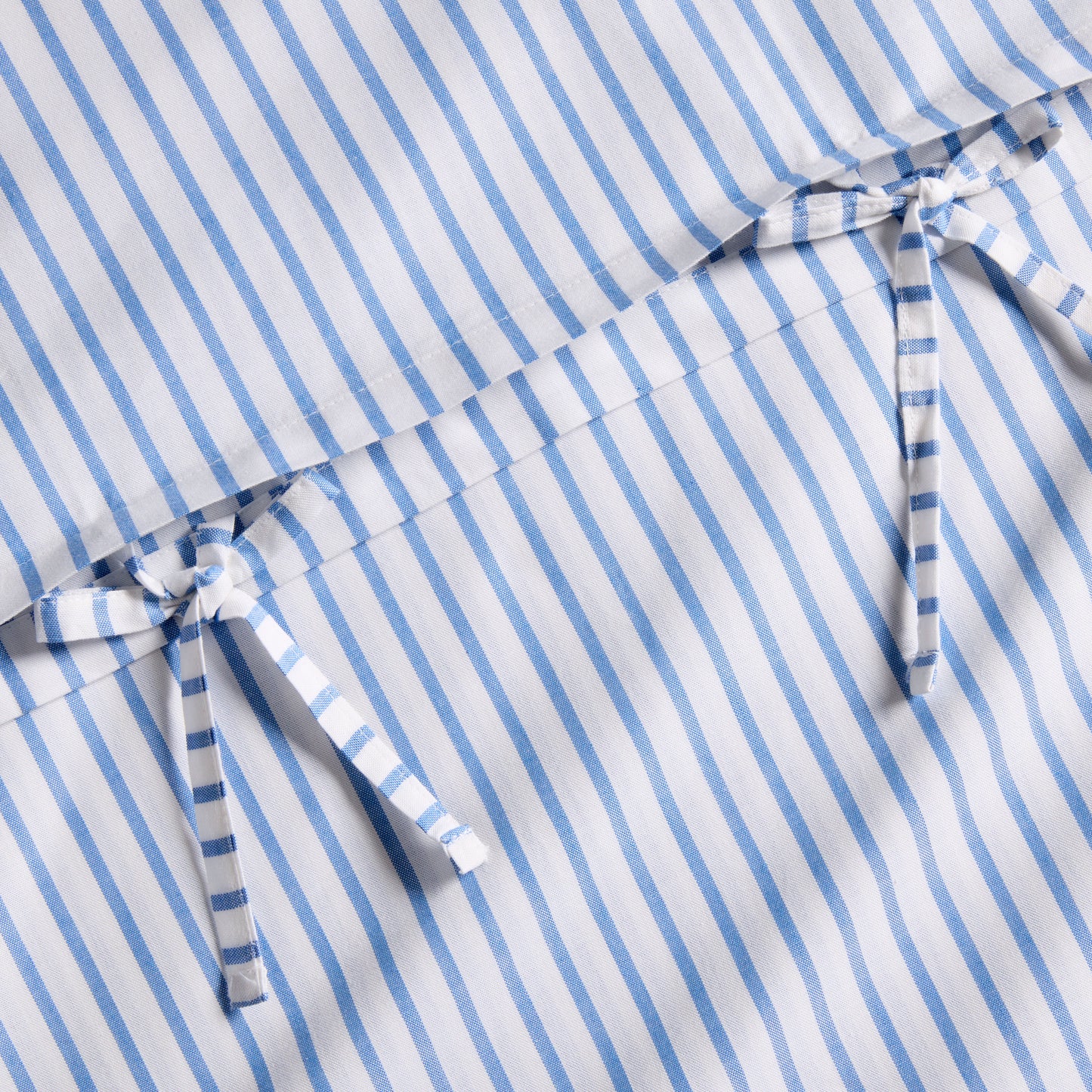 Blue Oxford Thin Stripe Cotton Euro Sham with tie closures.