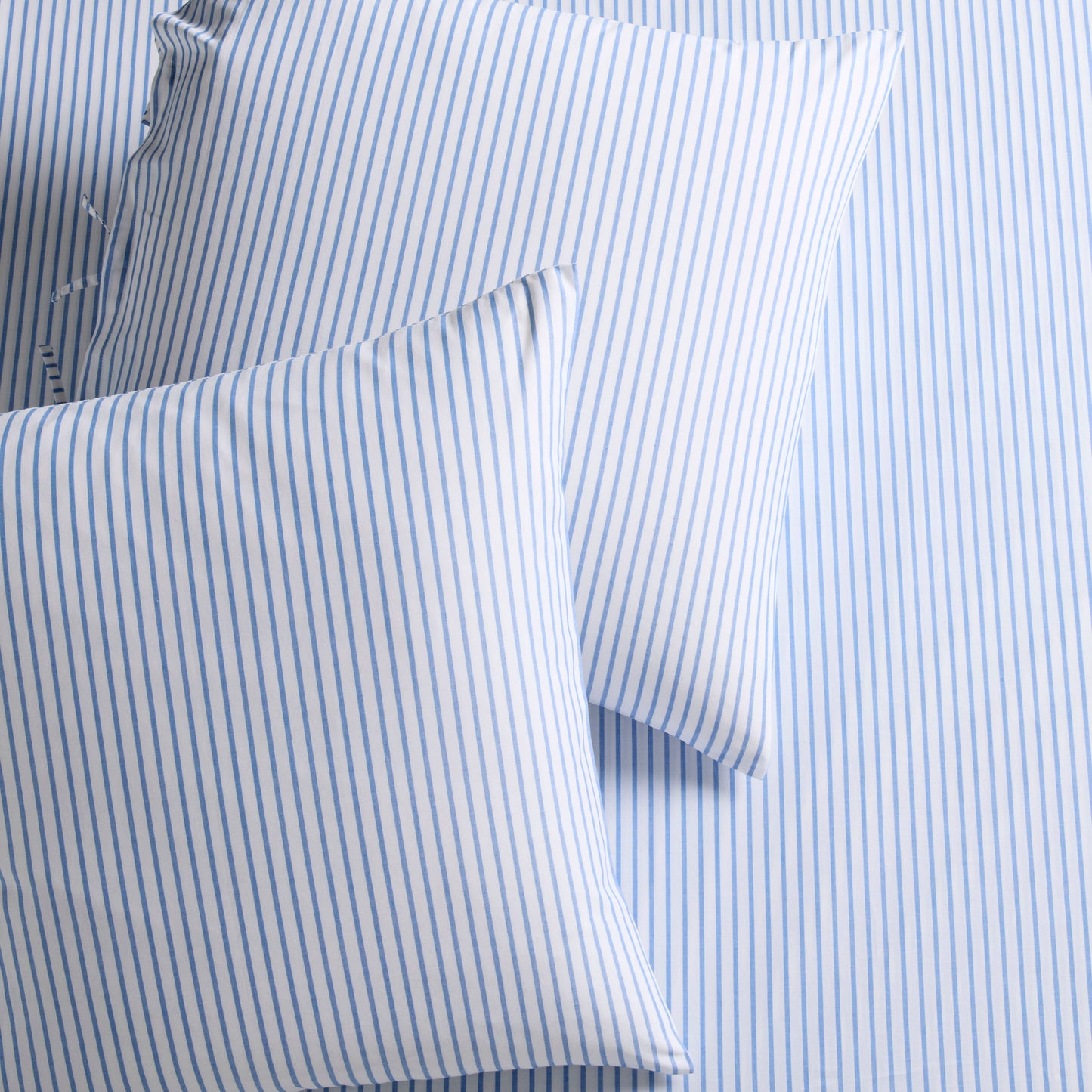 Set of 2 Blue Oxford Thin Stripe Cotton Euro Shams with tie closures.