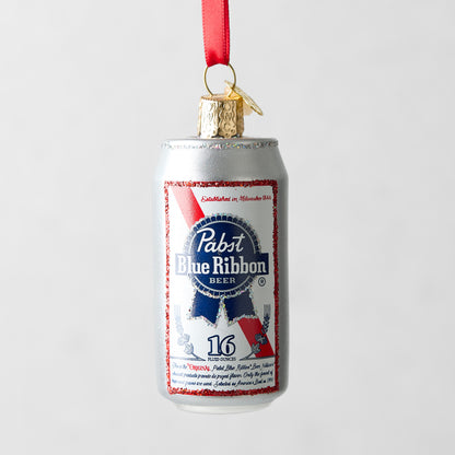 Hand-painted glass Pabst Blue Ribbon beer can Christmas ornament with red ribbon.
