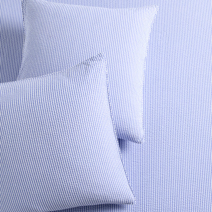 Set of 2 Blue Seersucker Stripe Organic Cotton Euro Shams with envelope closures.