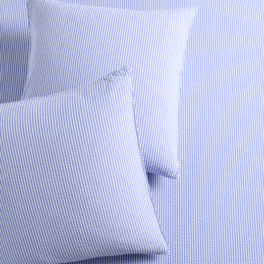 Set of 2 Blue Seersucker Stripe Organic Cotton Euro Shams with envelope closures.