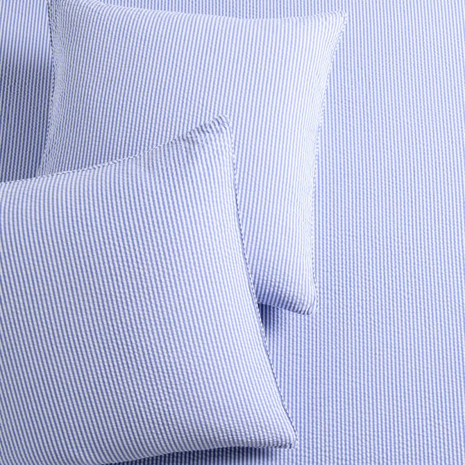 Set of 2 Blue Seersucker Stripe Organic Cotton Euro Shams with envelope closures.