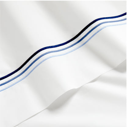 White percale sheet with blue triple-stitch detail.