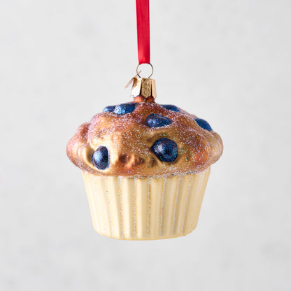 Sparkling glass blueberry muffin ornament with a red ribbon, hand-painted and glittered.