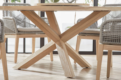 Boca Outdoor Round Dining Table, 63", natural solid teak wood with a unique X-base design.