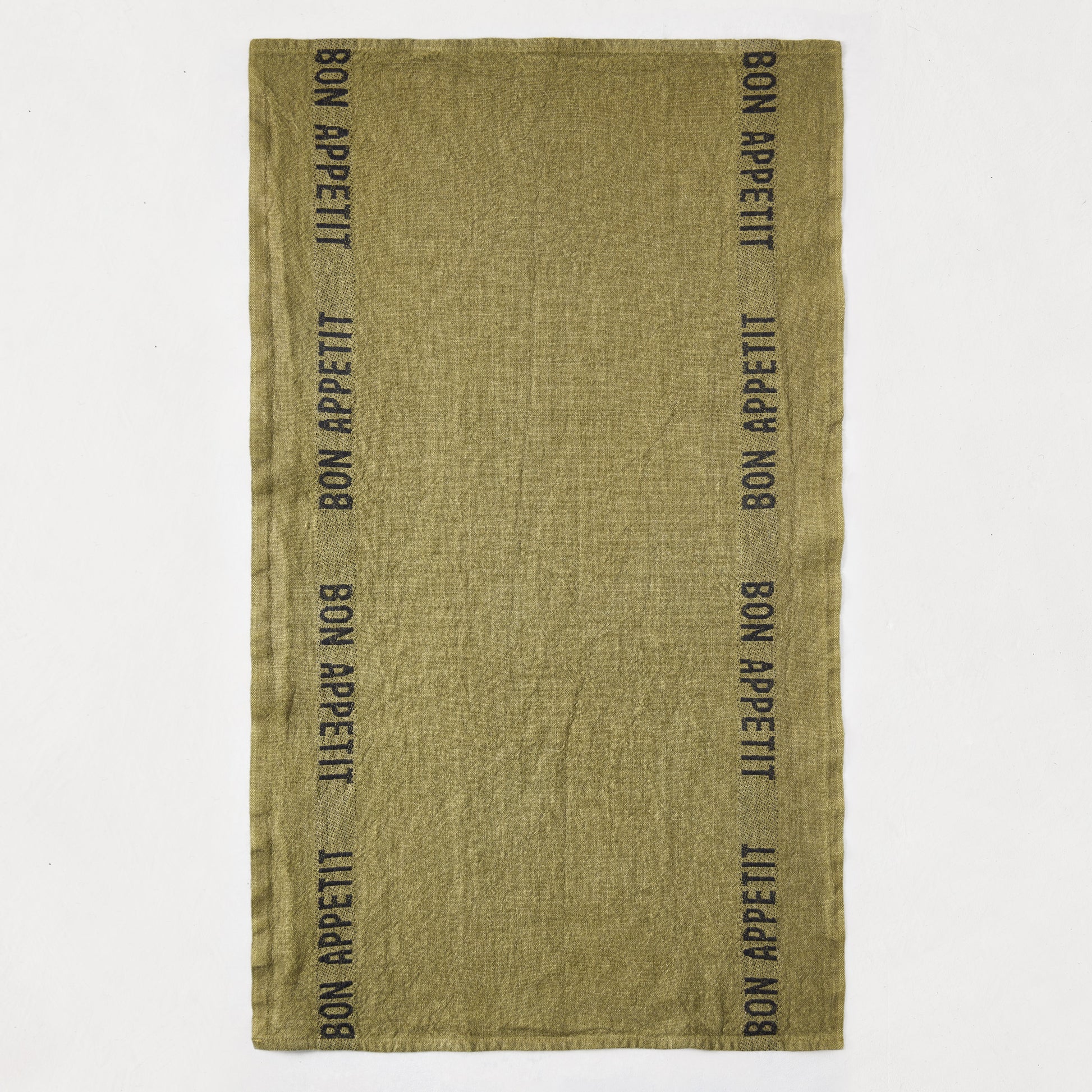 Set of 2 "Bon Appetit" dark green linen hand towels with black lettering, folded.