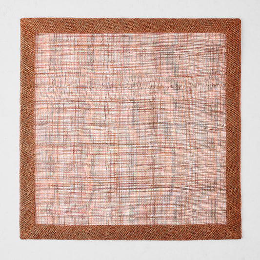 Square brick red abaca fiber placemat with a woven semi-transparent center and a solid textured border.