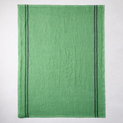Bright green French linen towel with two dark gray vertical stripes.