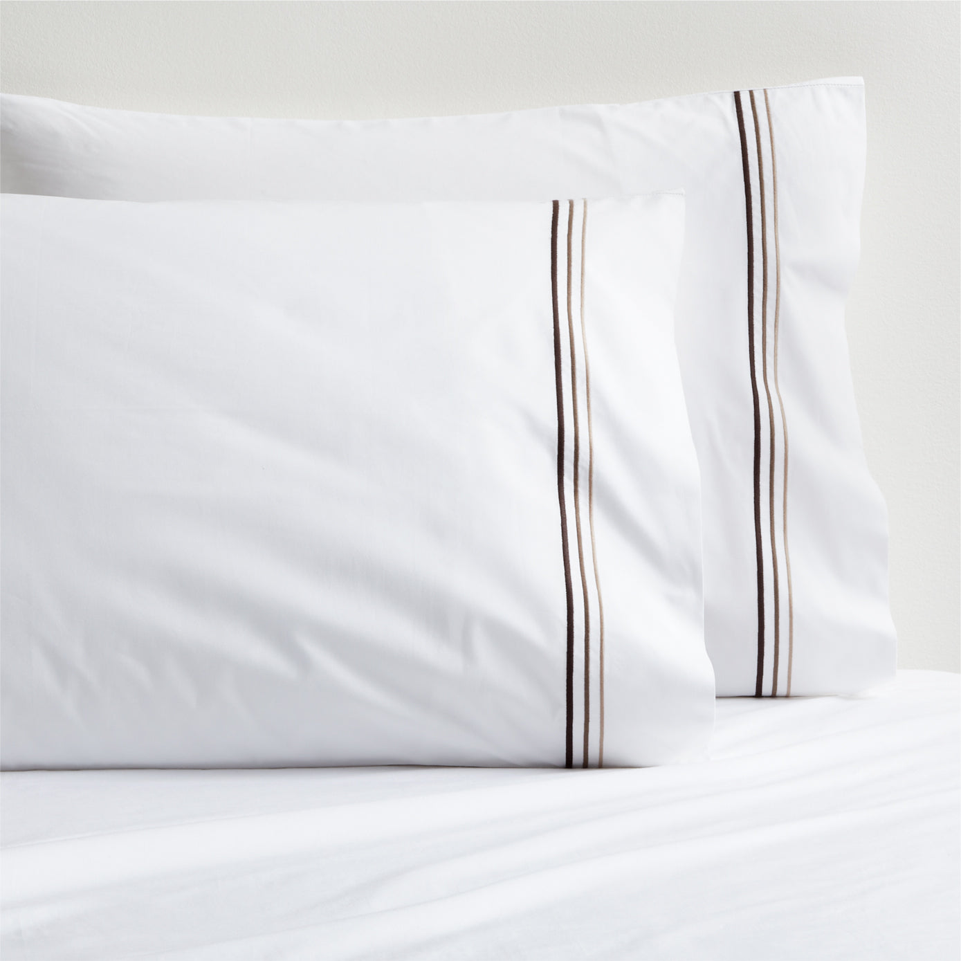 White percale pillowcases with brown triple stitch detail, set of 2.
