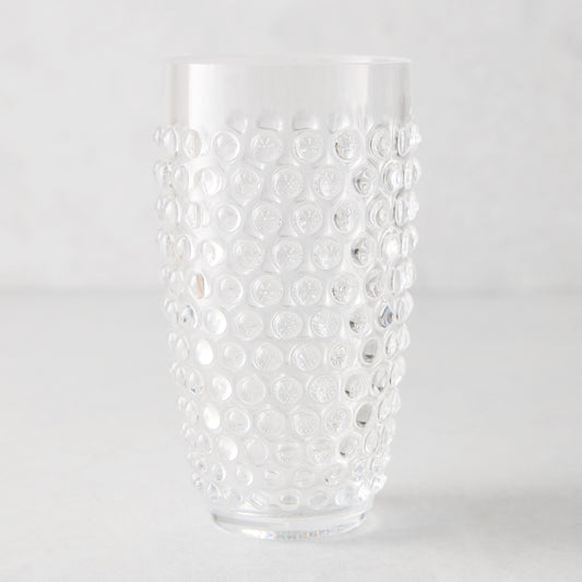 Clear bubble acrylic highball glass, 19oz, with textured dot pattern.