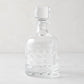 Clear lead-free eco-crystal decanter with a bubble pattern and square stopper.