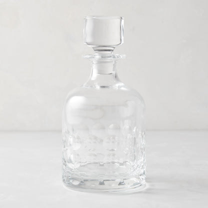 Clear lead-free eco-crystal decanter with a bubble pattern and square stopper.