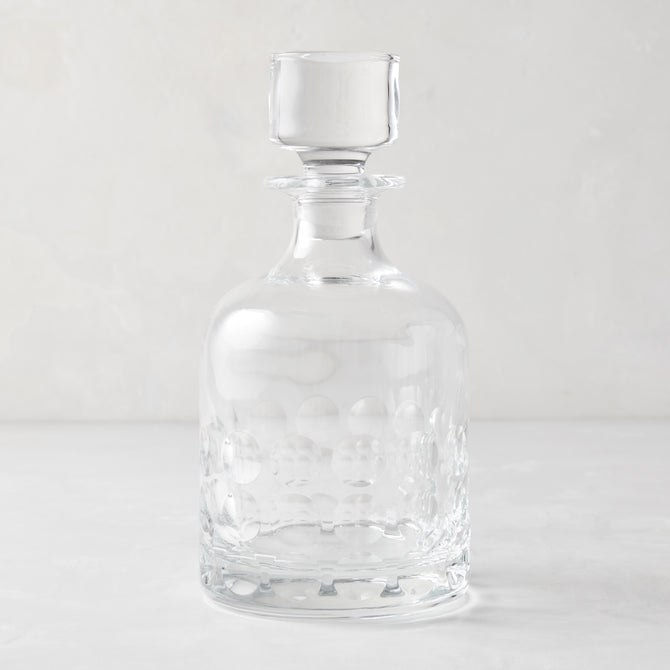 Clear lead-free eco-crystal decanter with a bubble pattern and square stopper.