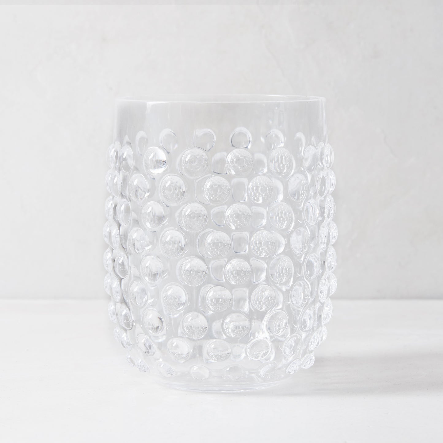 Clear bubble acrylic double old fashioned glass, 14oz, with textured surface.