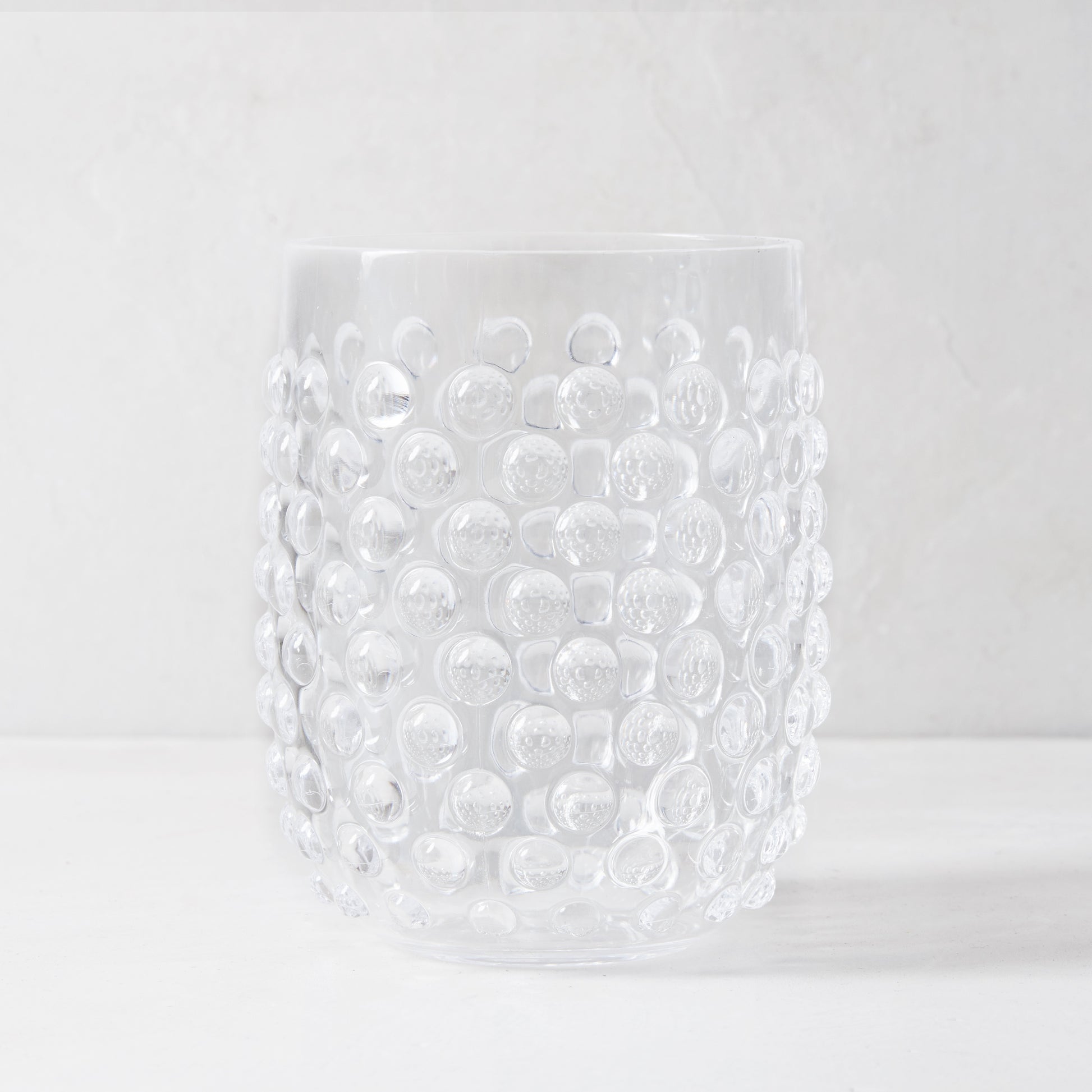 Clear bubble acrylic double old fashioned glass, 14oz, with textured surface.
