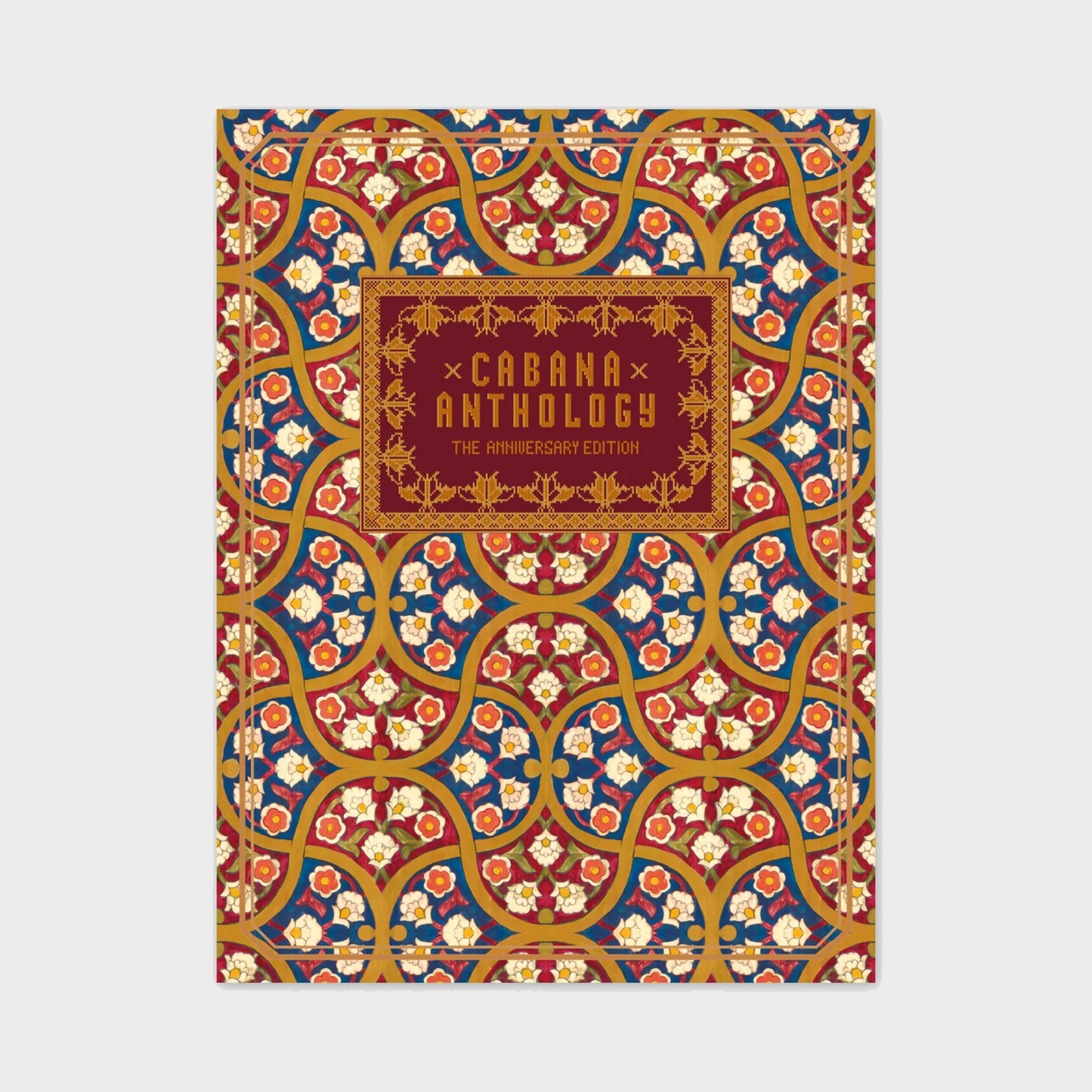 Cabana Anthology hardcover book featuring an intricate red, blue, and gold floral pattern with a central decorative title.