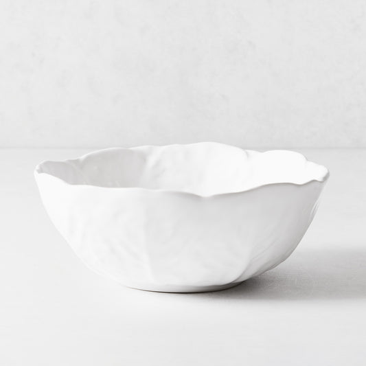 White ceramic cereal bowl with a textured cabbage leaf design, 10.6-inch diameter, made in Portugal.