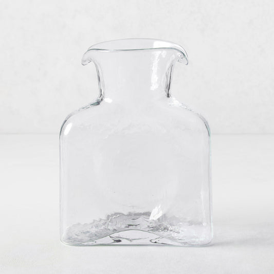 Cabell Square Glass Pitcher, clear hand-blown glass, 8"H, with dual spouts and textured finish.