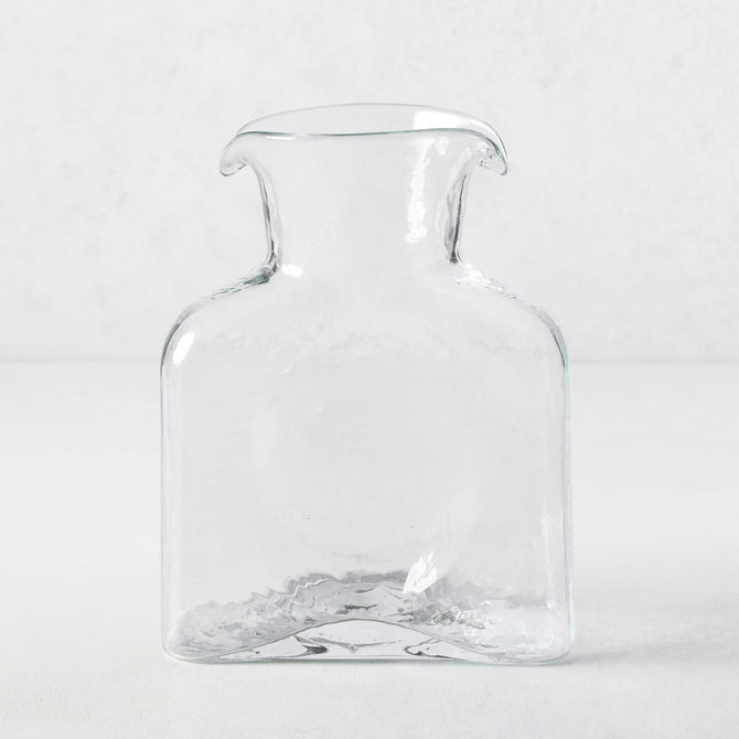 Cabell Square Glass Pitcher, clear hand-blown glass, 8"H, with dual spouts and textured finish.
