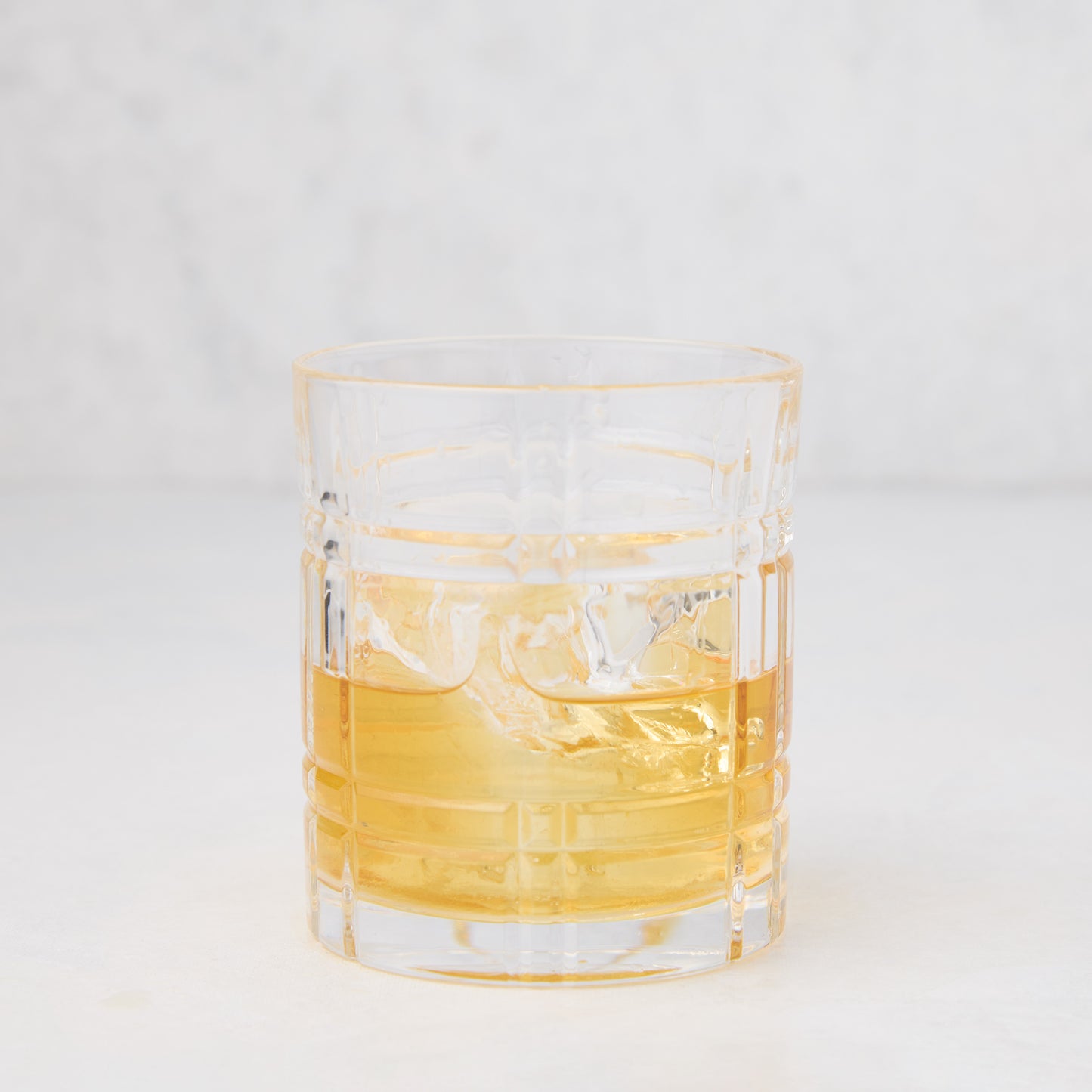 Camden Eco-Crystal Double Old-Fashioned Glass, 11oz, with whiskey and ice, featuring a cut glass pattern.
