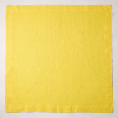 Canary HG Signature hand-dyed 22-inch square linen napkin, bright buttery yellow with mitered corners.