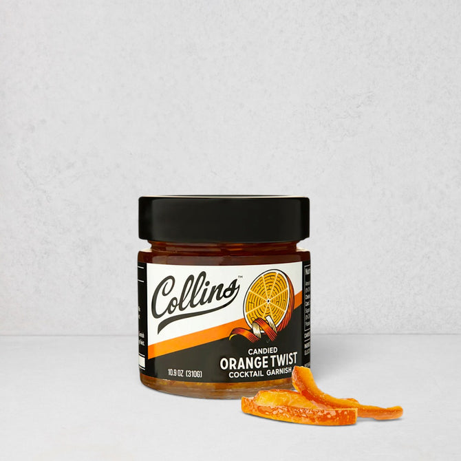 Collins Candied Orange Twist cocktail garnish in a 10.9 oz jar with loose candied peels.