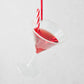 Glass Candy Cane Martini Christmas tree ornament with red liquid and striped straw.