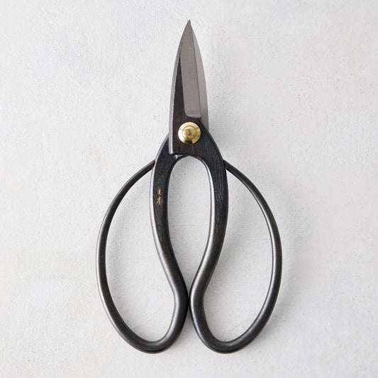 Carbon steel garden shears with dark, curved handles and a brass pivot.