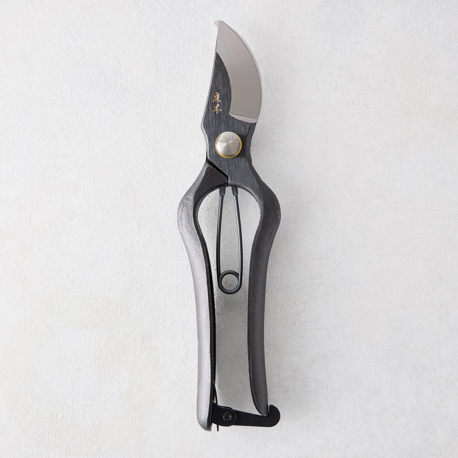 8"L Carbon Steel Sentei Garden Secateurs with dark gray clam blades and curved handles.