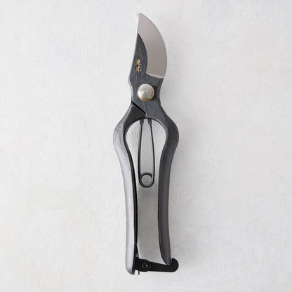 8"L Carbon Steel Sentei Garden Secateurs with dark gray clam blades and curved handles.