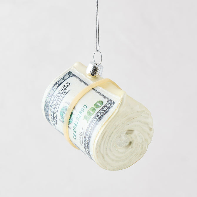 Hand-painted glass and resin cash roll Christmas ornament with glitter accents and a silver hanging loop.