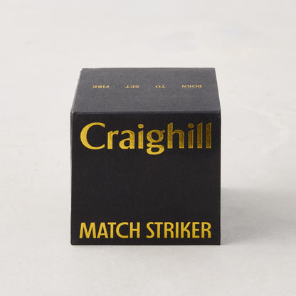 Craighill black match striker box with gold text.